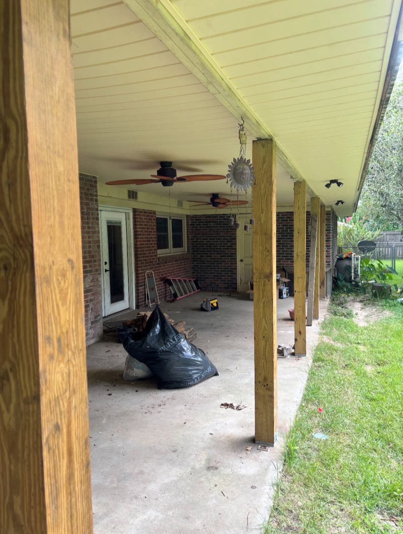 Back porch ceiling finished with white vinyl soffit